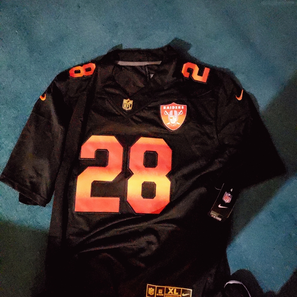 Men's Raiders jersey.   Never worn